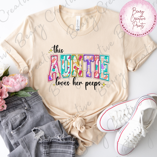 This Auntie Loves Her Peeps on a Cream Unisex T-shirt